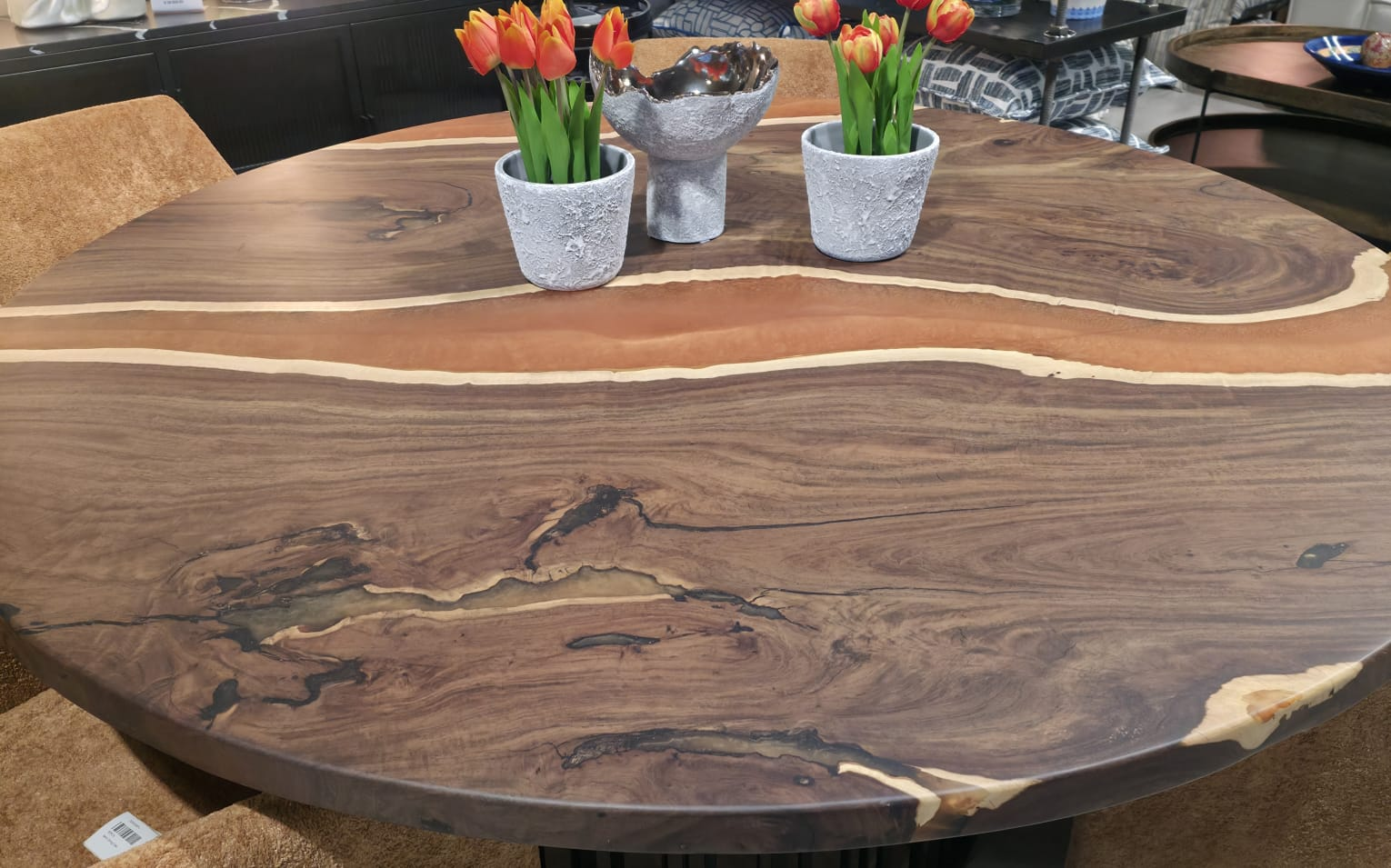 Round live-edge slab table with amber resin fills