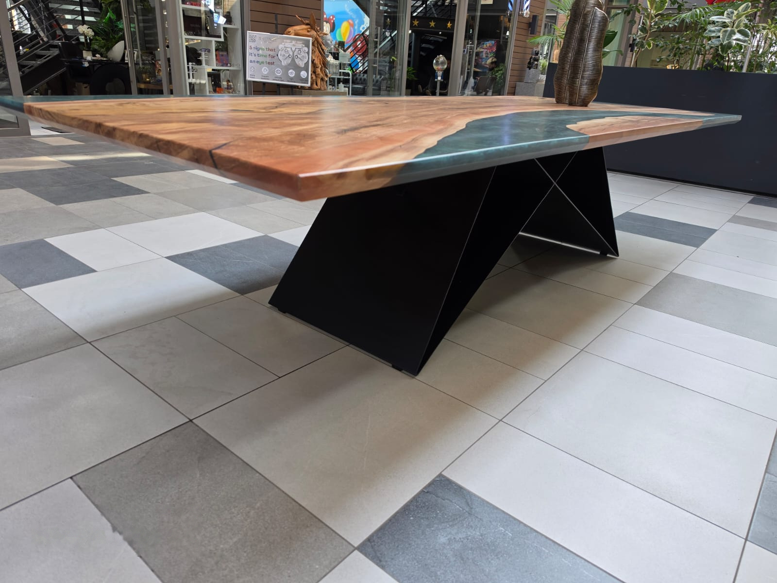 Teal epoxy river boardroom table in solid hardwood